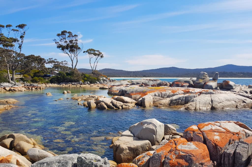 Colourful lagoon in the Bay of Fires on the east coast of Tasmania - one to add to the list of places to visit.